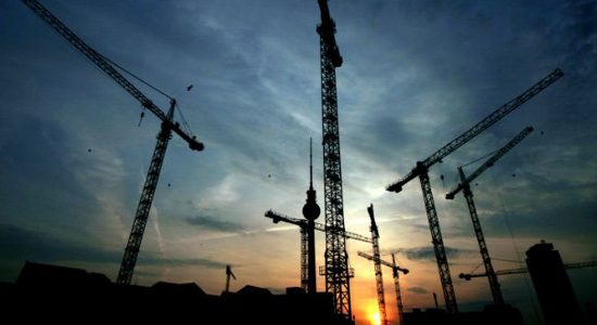 UK's double dip recession revised as output takes hit