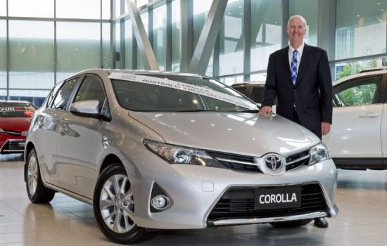 Toyota Australia executive director sales and marketing Tony Cramb with Australia's best-selling car of 2014, Toyota Corolla.