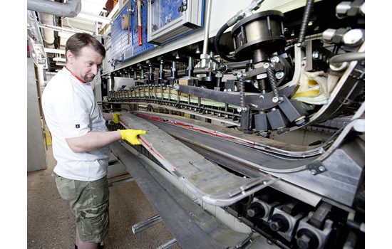 Flexing properties in skis are crucial because of compression on the top side and tension on the underside. Photo courtesy Atomic Austria GmbH