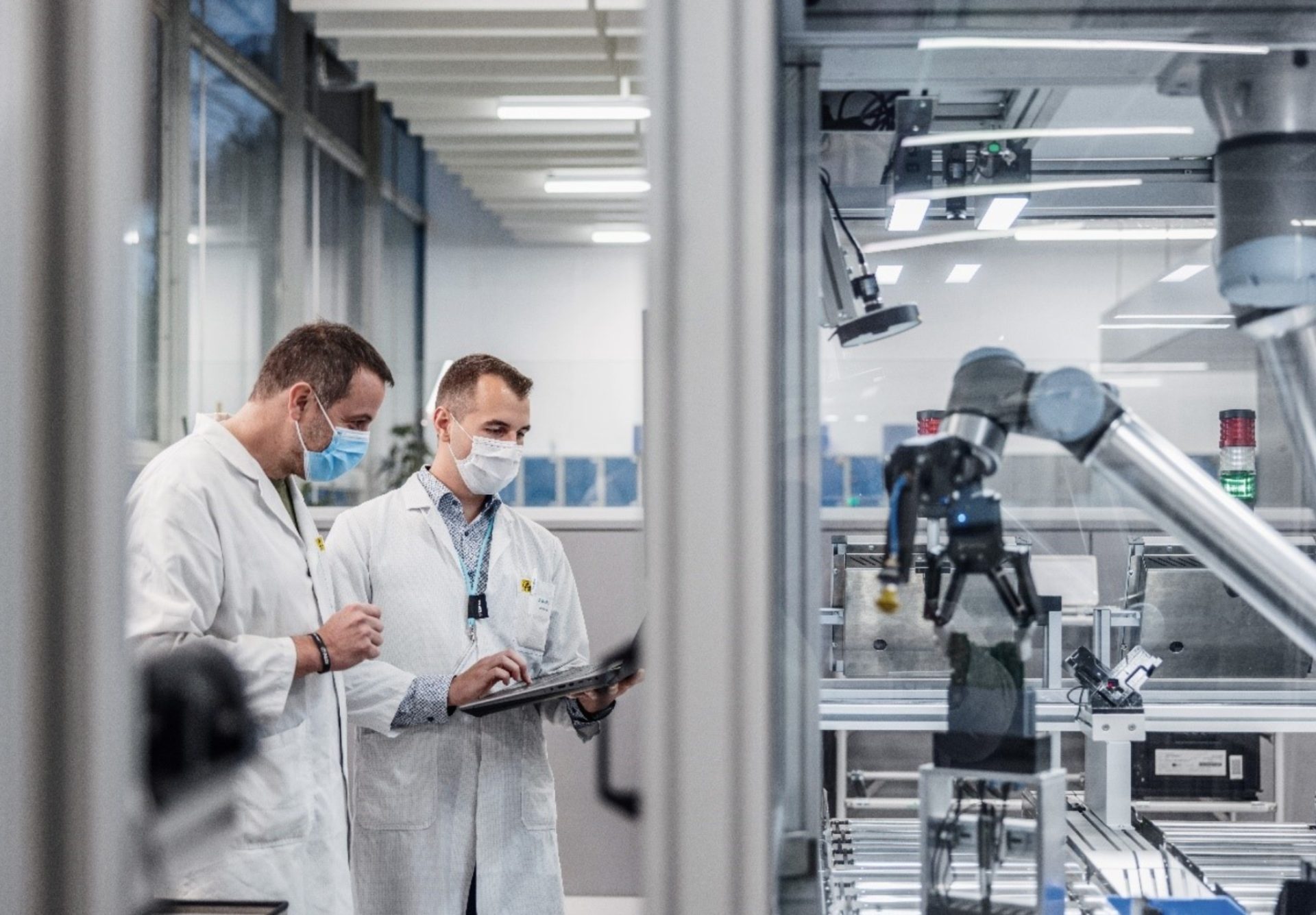 Driven by AI technologies like computer vision, industrial robots can operate more autonomously. (Image of Siemens Electronics Factory in Erlangen, credit: Getty Images)