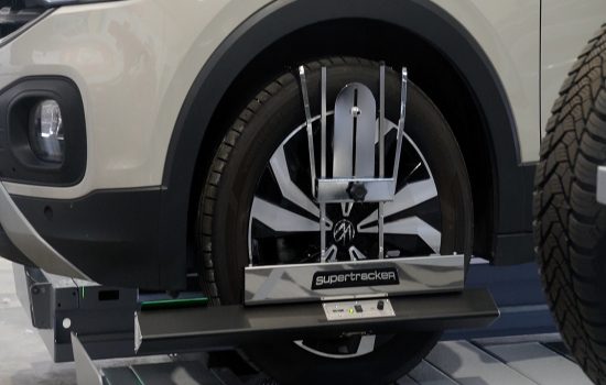 A Supertracker wheel alignment system on a car