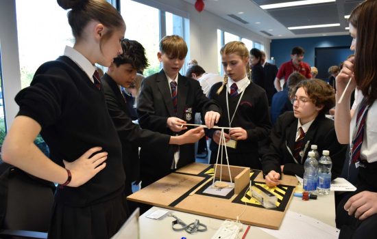 Students from Hinchley Wood School, winners of the Key Stage 3 category, working on their construction during the challenge